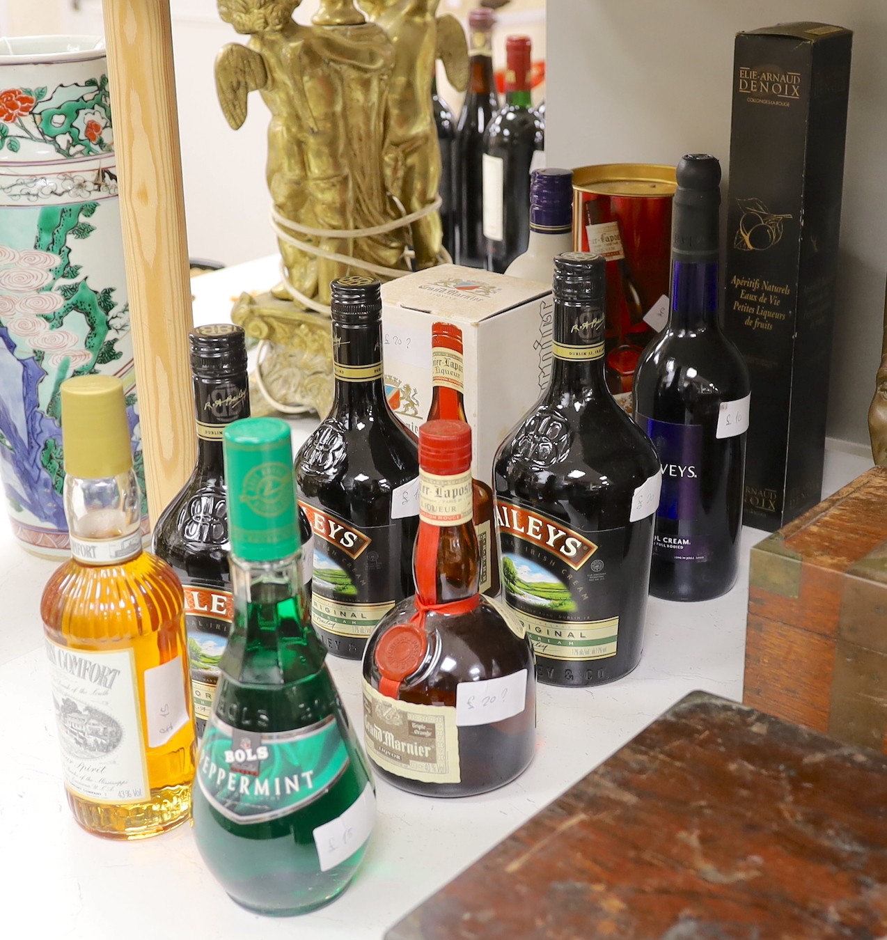 An assortment of liqueurs and others, to include baileys, southern comfort, grand marnier, etc.